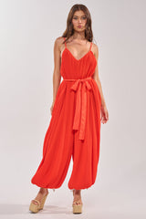 VACATIONING PLEATED JUMPSUIT IN ORANGE