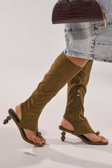 AZALEA WANG DOTTIE OLIVE STRETCH FAUX SUEDE BOOT WITH EMBELLISHED HEEL AND TOE HARDWARE