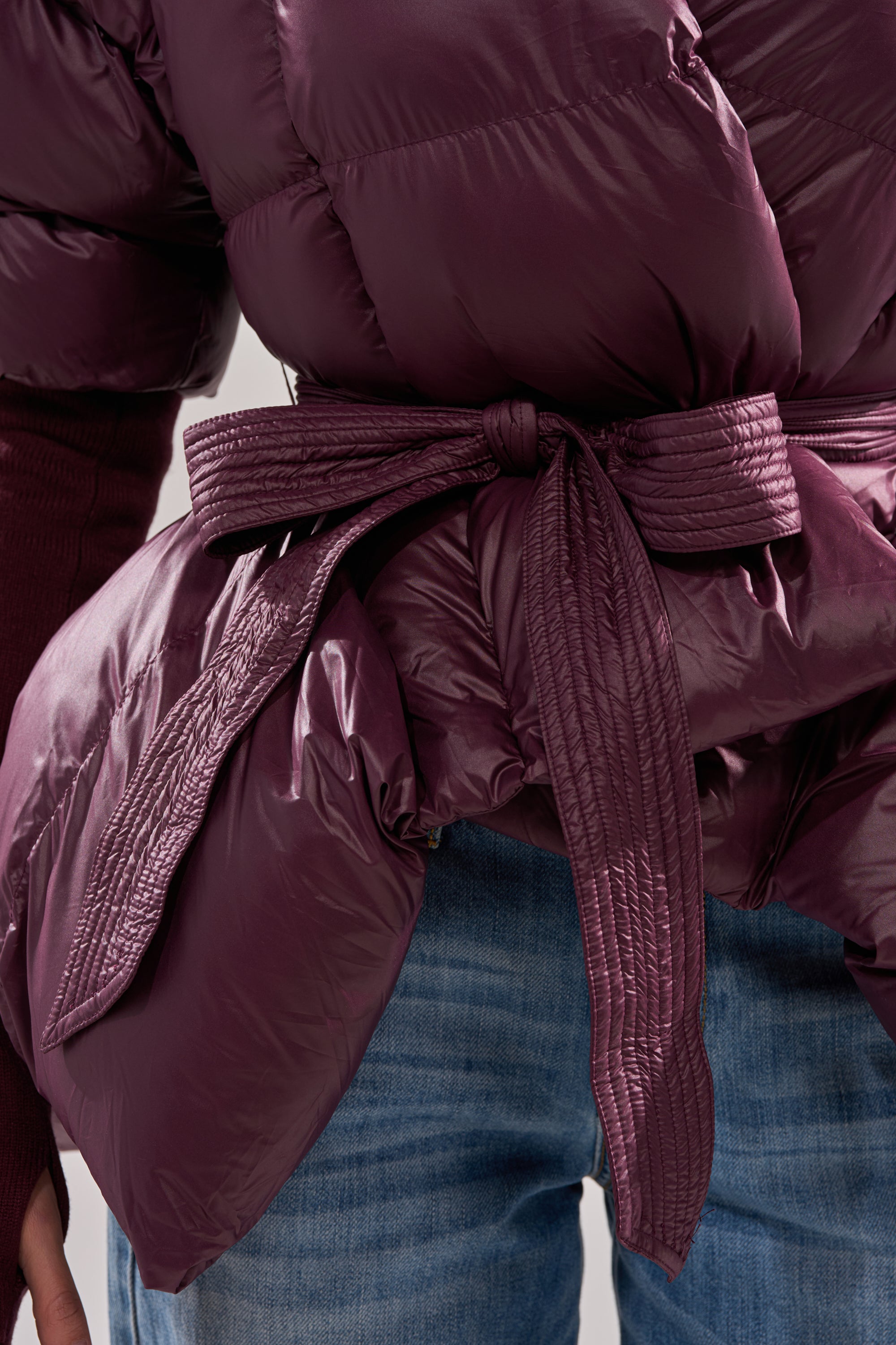 RIB SLEEVE PEPLUM PUFFER IN PURPLE