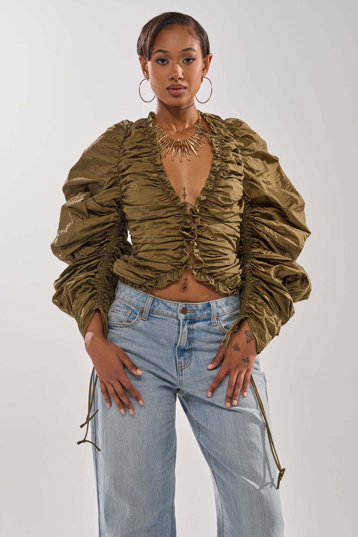 IN IT TO WIN IT RUCHED BLOUSE