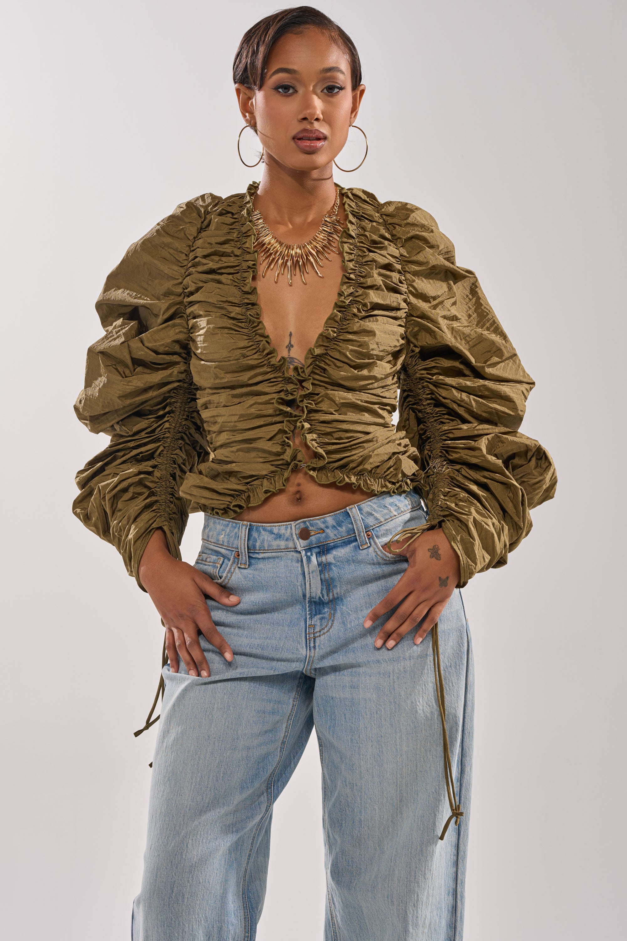 IN IT TO WIN IT RUCHED BLOUSE
