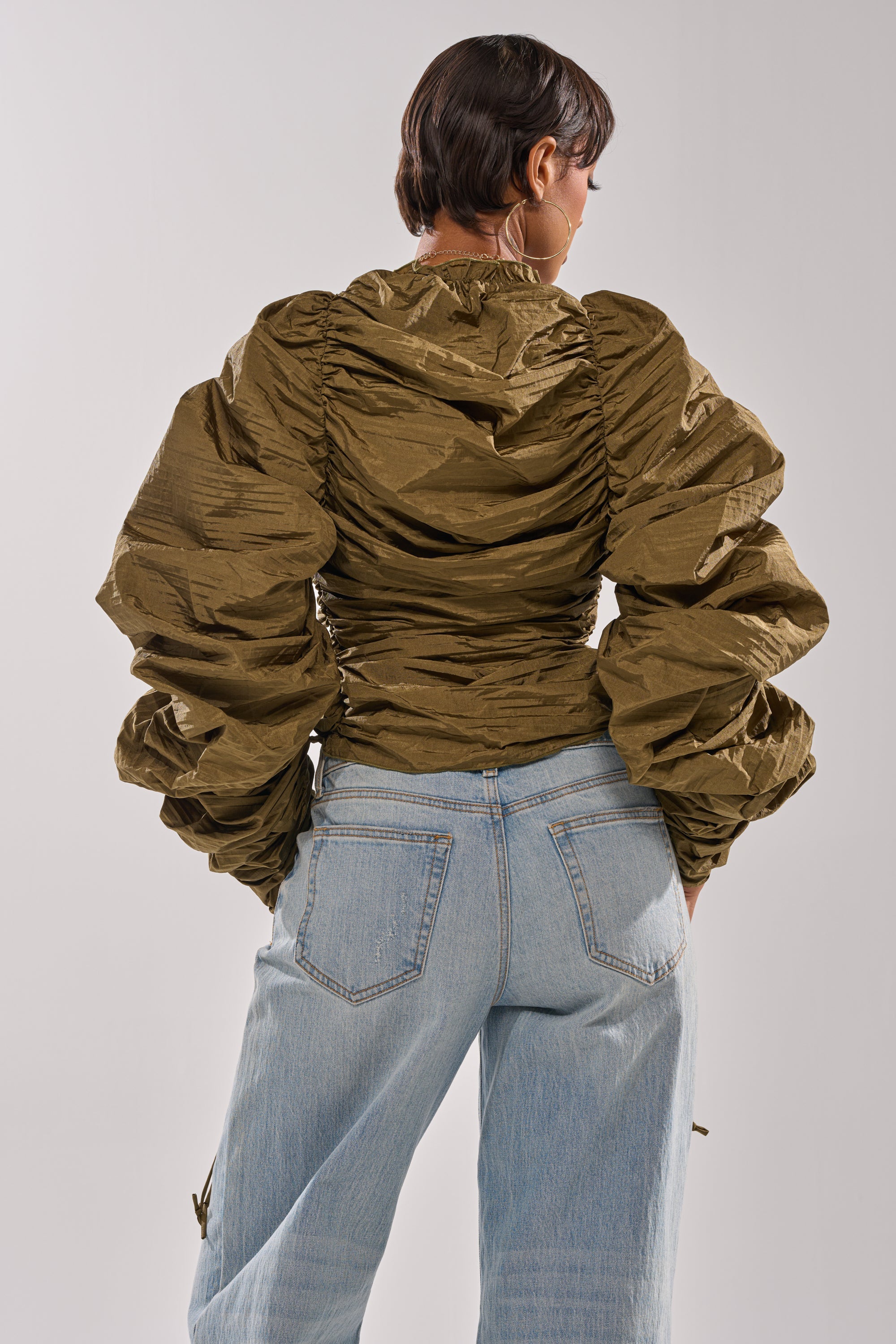 IN IT TO WIN IT RUCHED BLOUSE