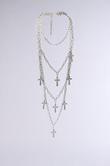 LAYERS TO THIS CROSS NECKLACE