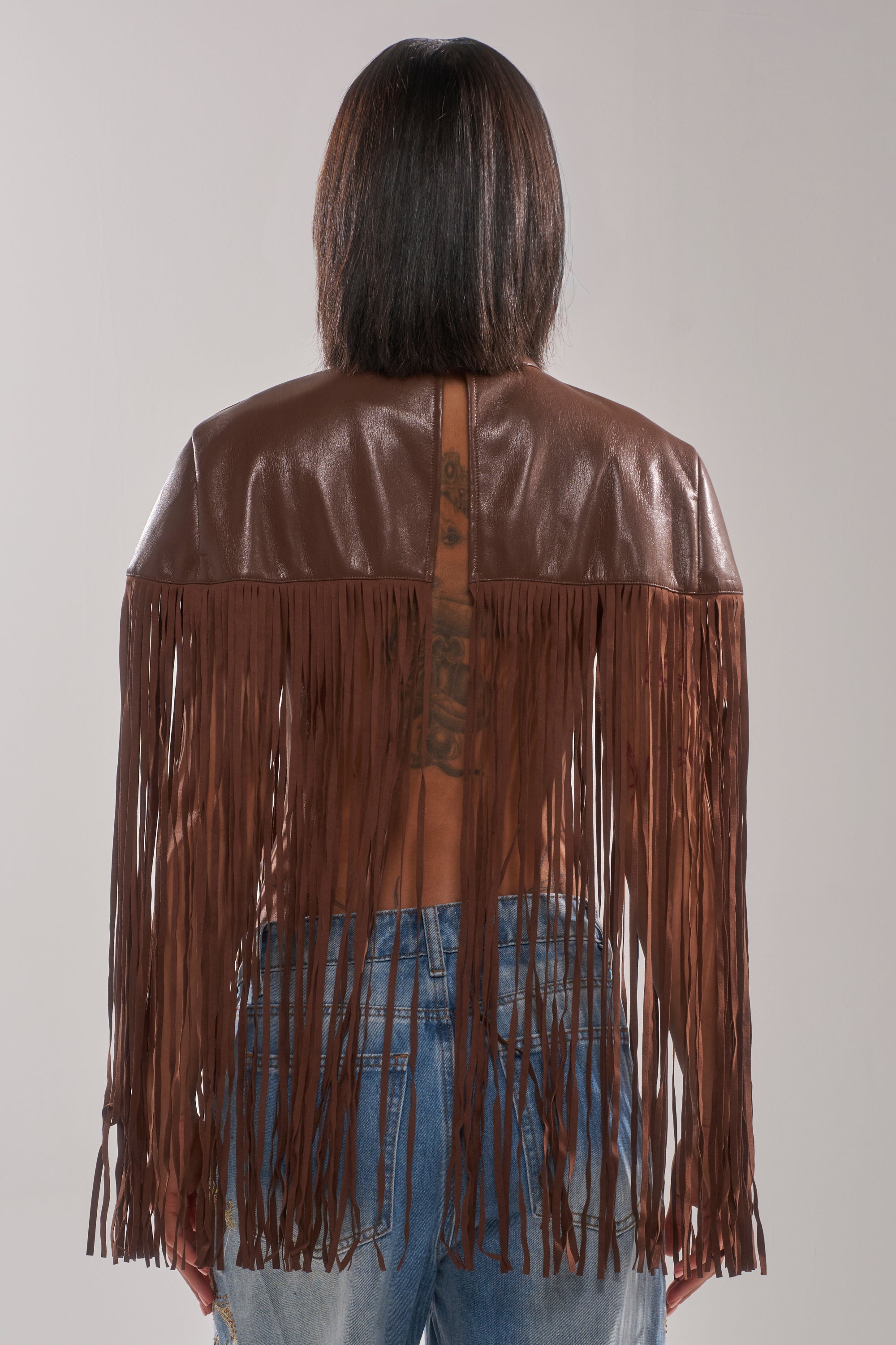 FRINGE FOR DAYS FAUX LEATHER TOP