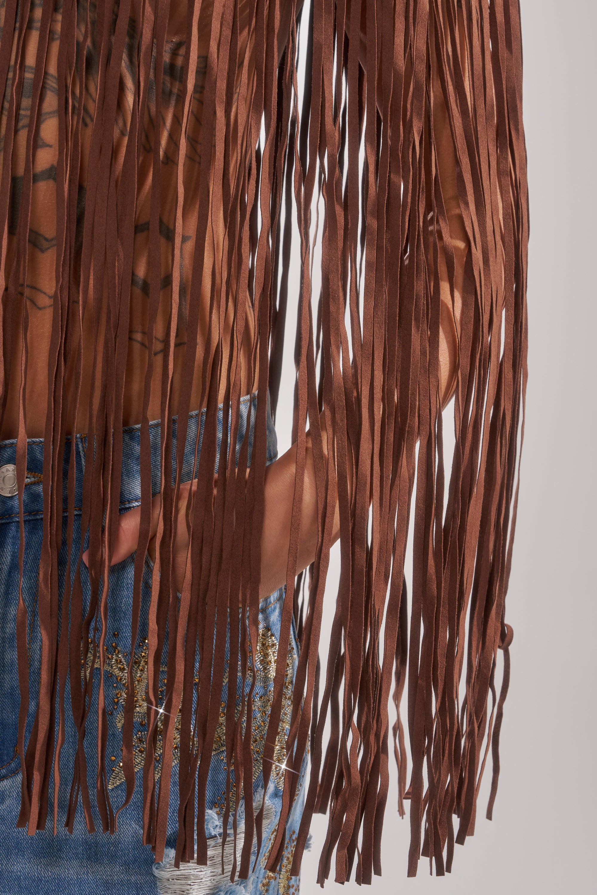 FRINGE FOR DAYS FAUX LEATHER TOP