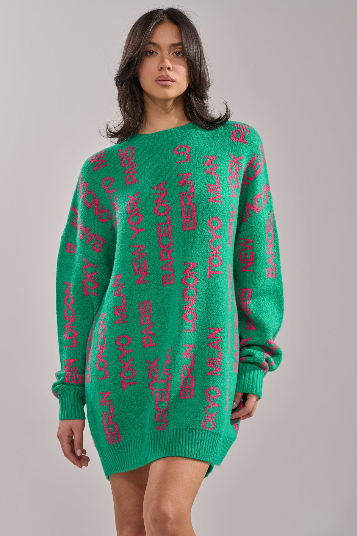 AROUND THE WORLD SWEATER MINI DRESS IN GREEN