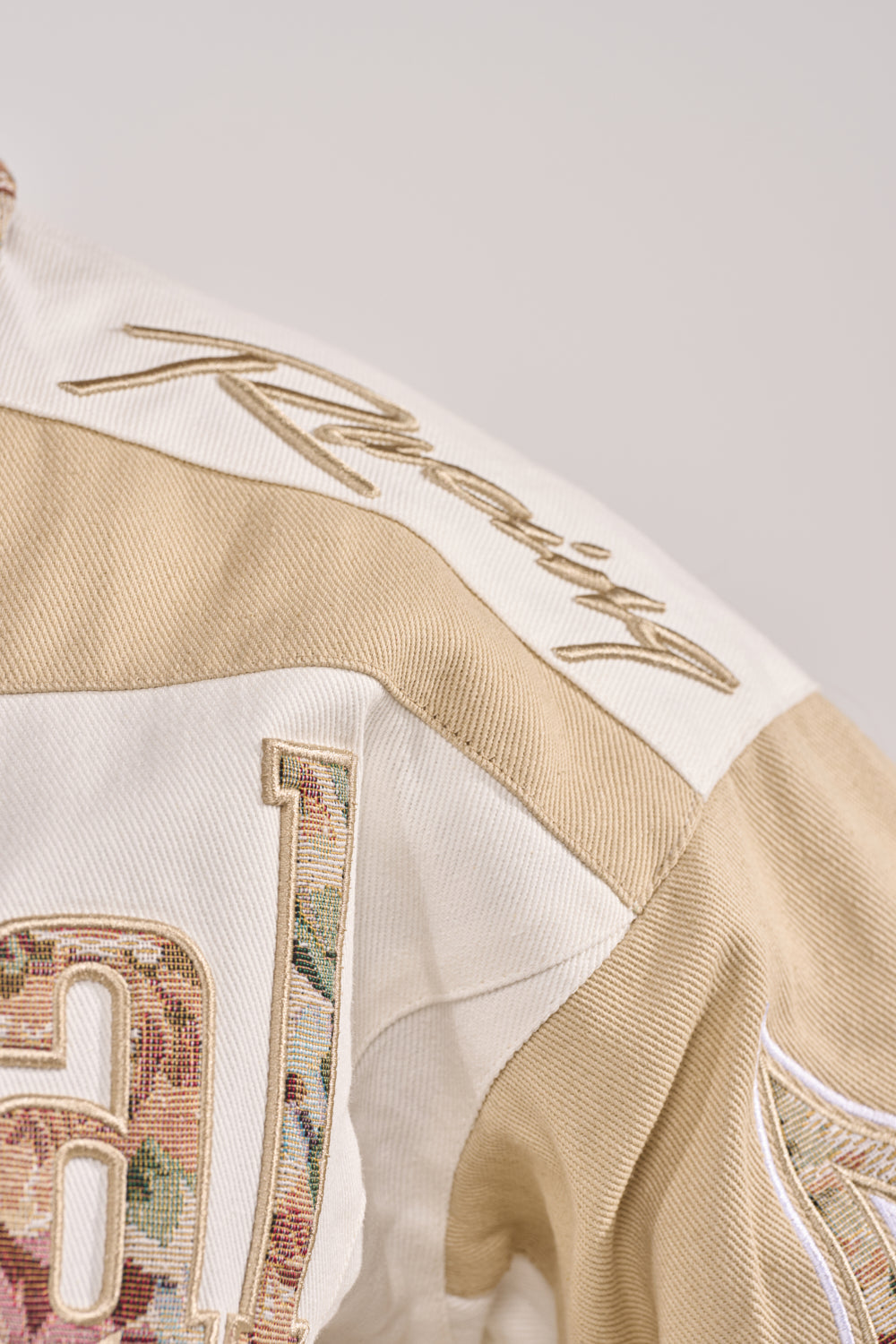 STILL THE ONE EMBROIDERED BOMBER