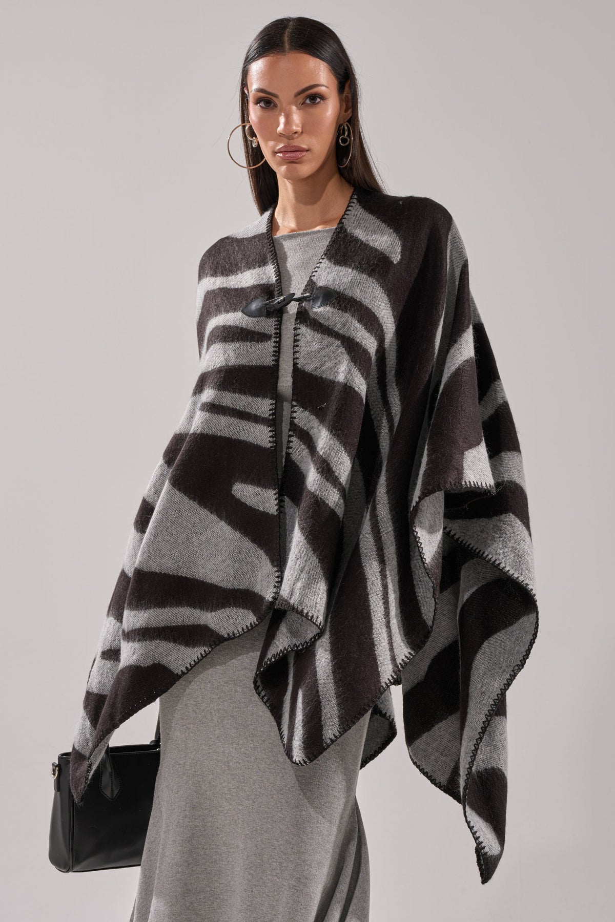 WILD CHILD KNIT PONCHO