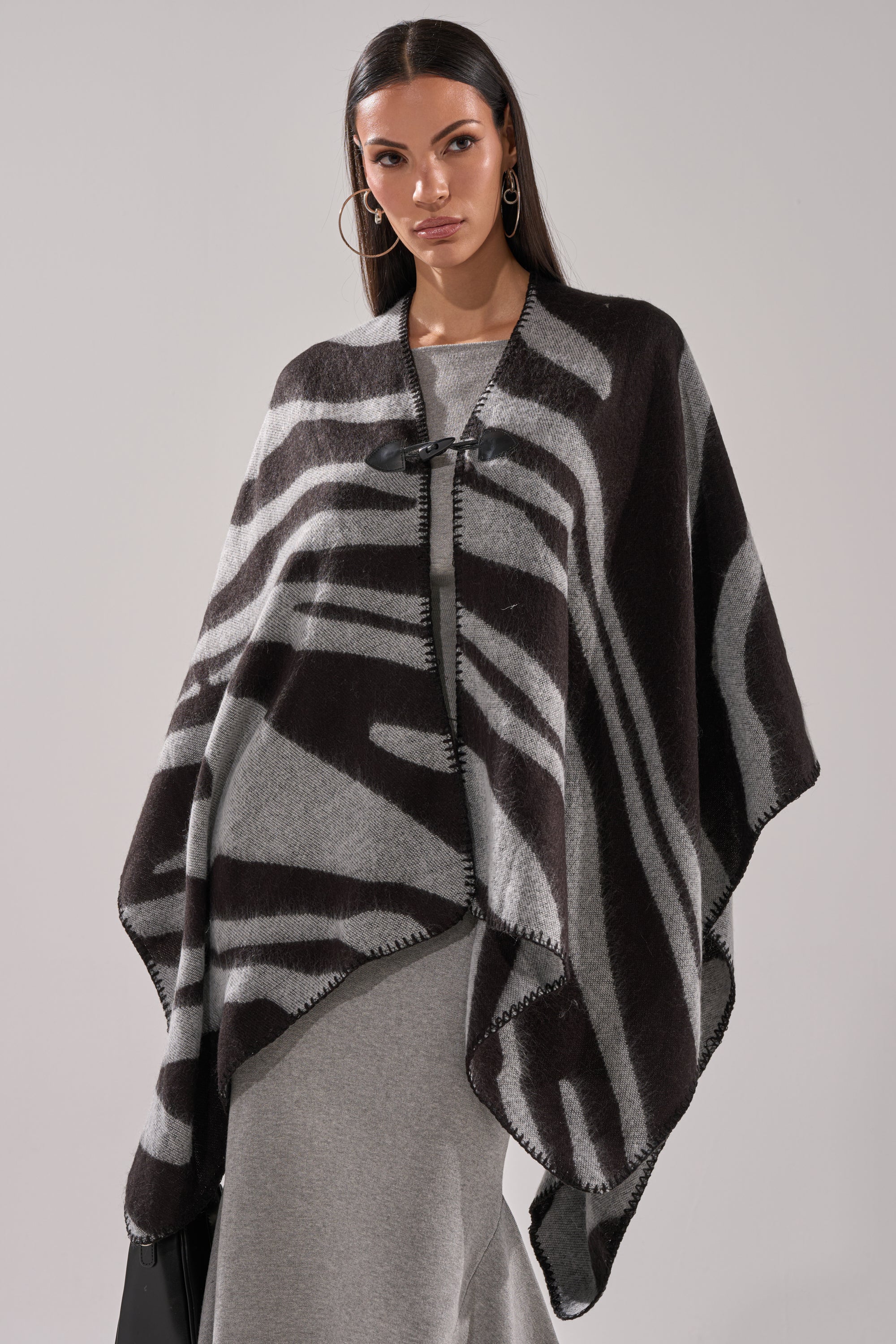 WILD CHILD KNIT PONCHO