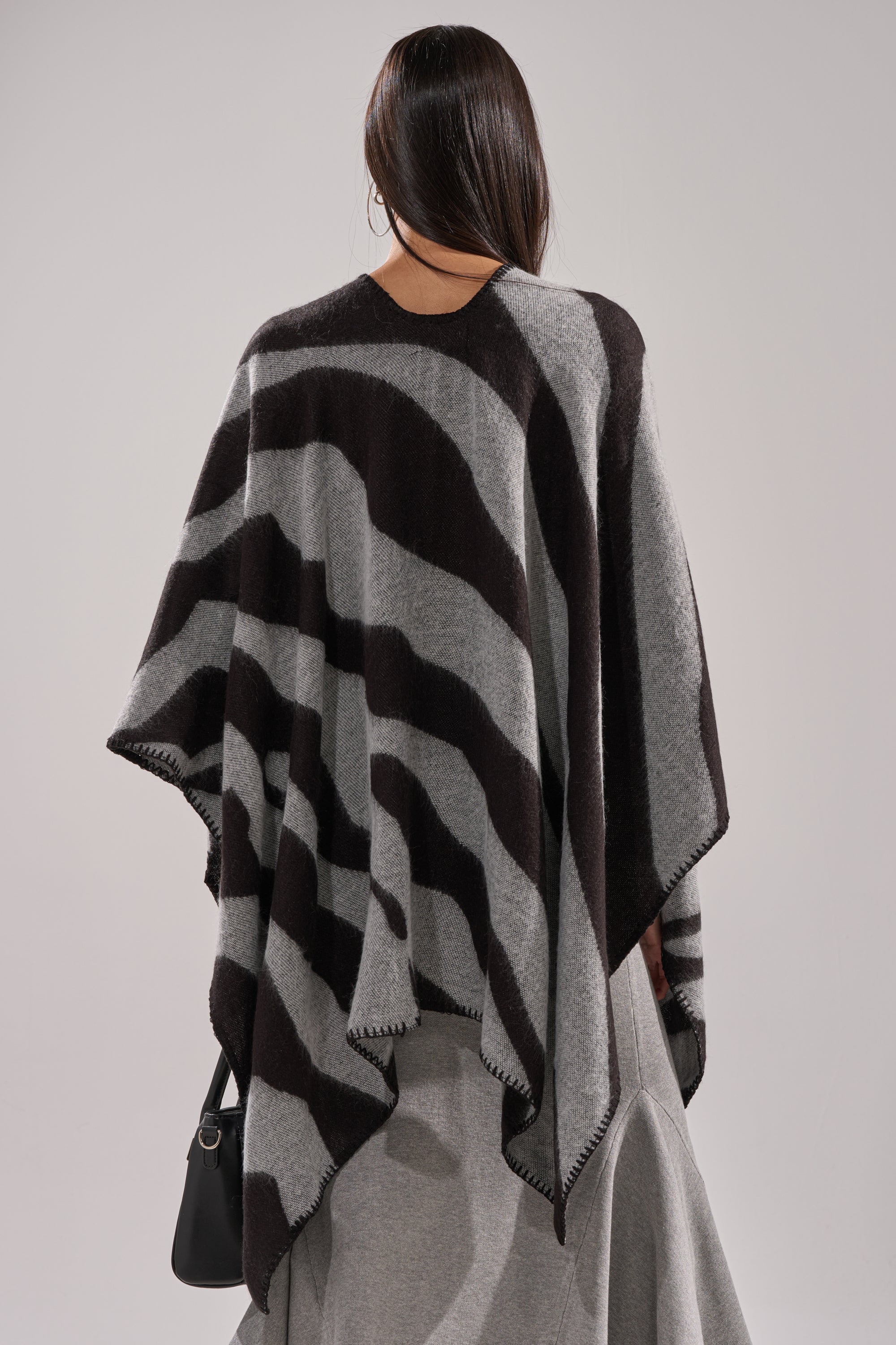 WILD CHILD KNIT PONCHO