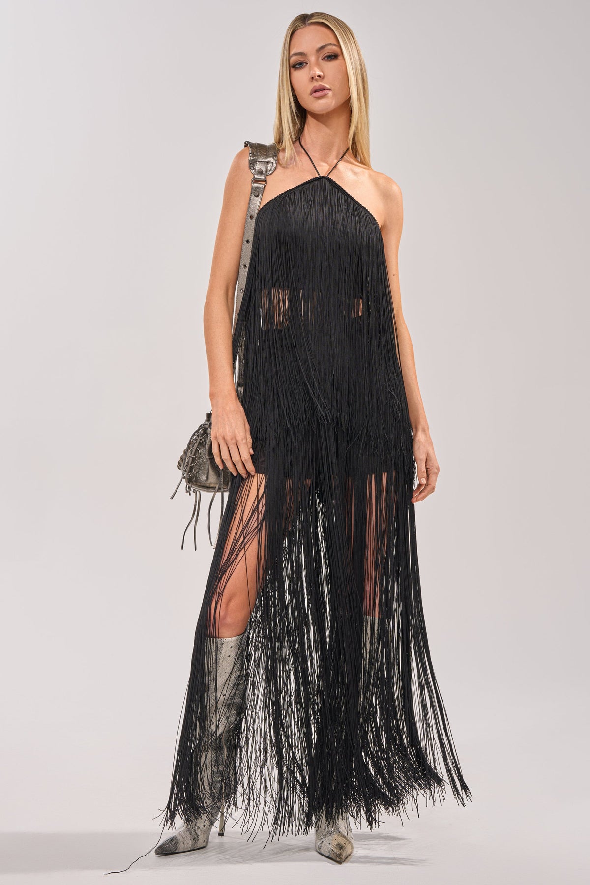 ON THE EDGE FRINGE HALTER TOP IN BLACK