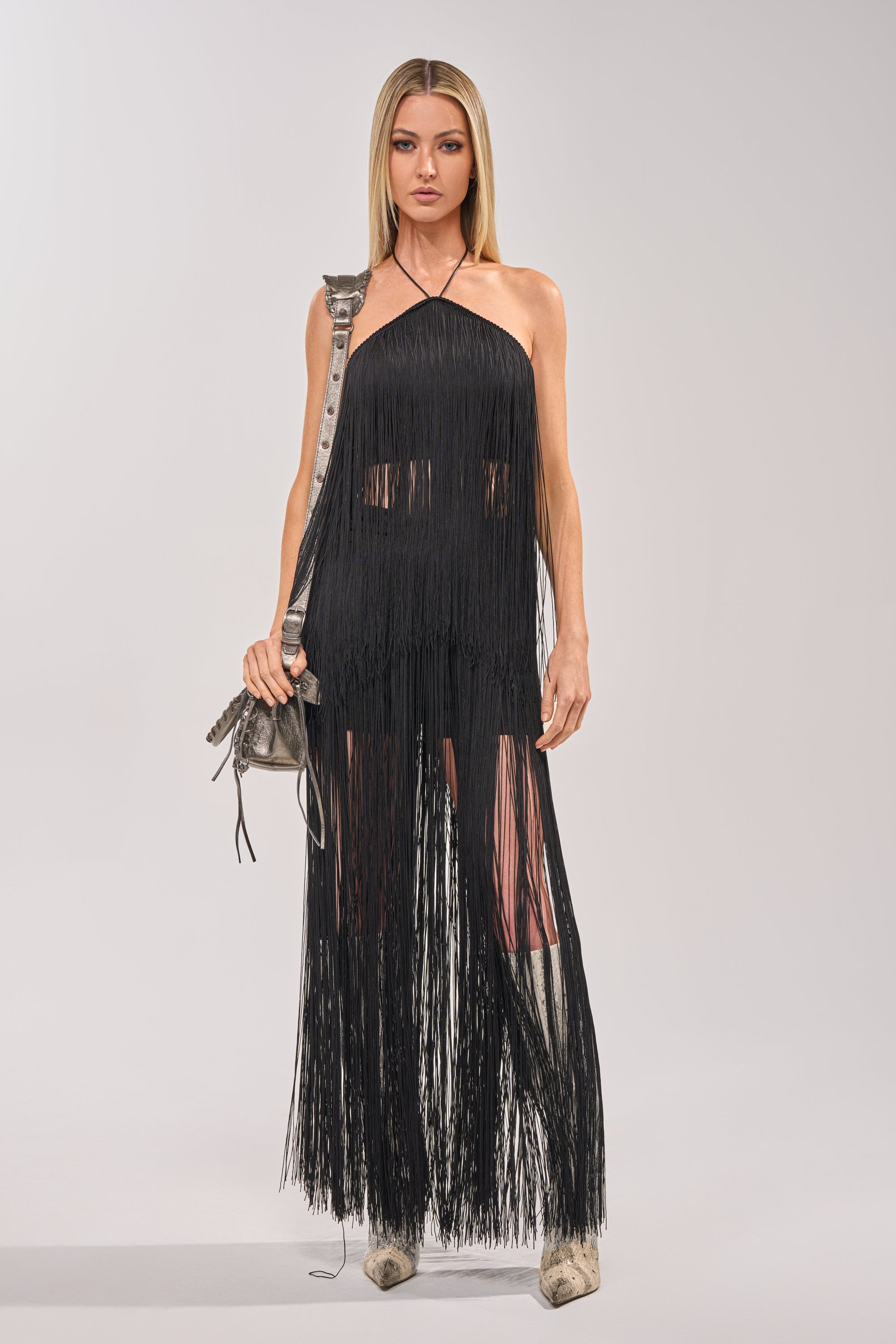 ON THE EDGE FRINGE HALTER TOP IN BLACK